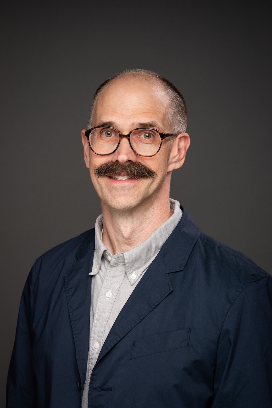 Professional headshot of H. Whitt Kilburn