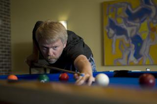 [picture of GCM at pool table (Photo by Bernadine Carey-Tucker)]